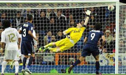 Real Madrid&#039;s goalkeeper Iker Casillas fails to stop Santiago Cazorla&#039;s free kick.