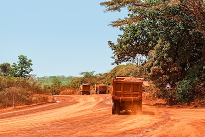 Trucks transporting bauxite in Guinea, where 83% of the country's 23,000 chimpanzees live in areas of mining interest. 