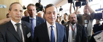 ECB President Mario Draghi arrives at the European Parliament on Monday.