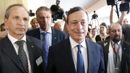ECB President Mario Draghi arrives at the European Parliament on Monday.