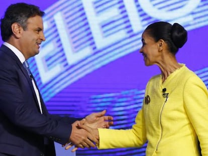 Aécio Neves greets Marina Silva at the TV debate.