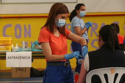 A teacher receives a second dose of the AstraZeneca vaccine in Gines, Seville.