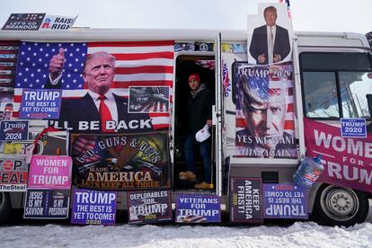 An RV, that is parked outside Team Trump New Hampshire headquarters, is visited by supporters, Saturday, Jan. 20, 2024, in Manchester, NH.