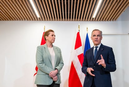 Canadian Prime Minister Mark Carney, right, takes part in a bilateral meeting with Prime Minister of Denmark Mette Frederiksen, at the Canadian Embassy in Paris, France, Tuesday, Jan. 6, 2026