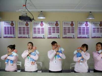 Estudiantes de un programa de cuidadores domésticos, en Pekín.