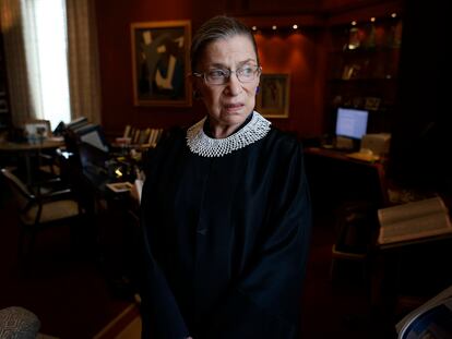 Associate Justice Ruth Bader Ginsburg poses for a photo in her chambers at the Supreme Court in Washington, Wednesday, July 24, 2013, before an interview with the Associated Press. Ginsburg said during the interview that it was easy to foresee that Southern states would push ahead with tougher voter identification laws and other measures once the Supreme Court freed them from strict federal oversight of their elections.  (AP Photo/Charles Dharapak)