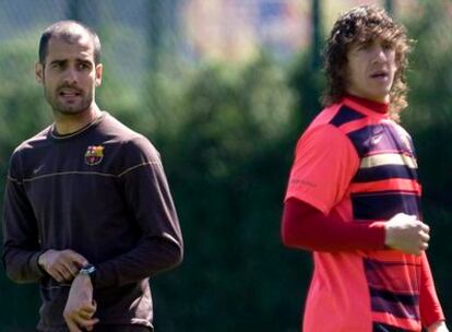 Puyol y Guardiola.