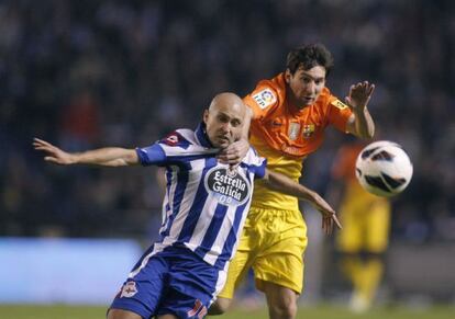 Leo Messi battles with Depor defender Laureano Sanabria in A Coru&ntilde;a. 