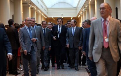 Entrada de Mariano Rajoy en el edificio del Senado, donde se celebra la sesión plenaria por obras en el Congreso de los Diputados.