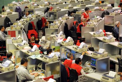 Operadores de mercados en la Bolsa de Hong Kong.