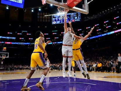 Denver Nuggets center Nikola Jokic shoots over Los Angeles Lakers forward Anthony Davis in the second half of Game 4 of the NBA basketball Western Conference Final series, on May 22, 2023.