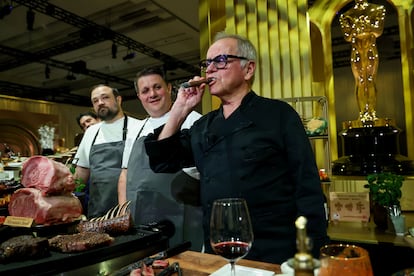 Wolfgang Puck, with one of the chocolate cigars that he will serve at the Governor's Ball, the party held after the Oscars, on March 10.