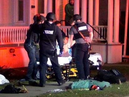 First responders treat a victim after a gunman shot and wounded three college students of Palestinian descent in Burlington, Vermont, U.S. November 25, 2023 in a still image from video.