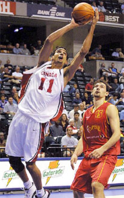 El canadiense David Thomas y Jorge Garbajosa en un momento del partido.