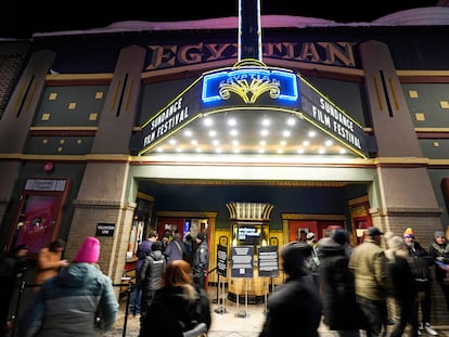 Pedestrians walk down Main Street in front of the Egyptian Theatre during the 2023 Sundance Film Festival on Saturday, Jan. 21, 2023, in Park City, Utah.