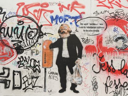 Karl Marx en un grafiti en el Muro de Berlín.