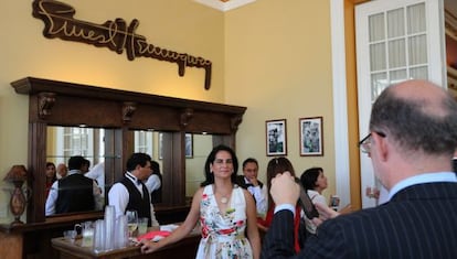 Guests inside the Ernest Hemingway bar at the Cuban Embassy on Monday.