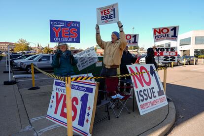 People gather in a parking lot as people arrive for early in-person voting in Cincinnati, Nov. 2, 2023. Ohio is expected to play a starring role in the 2024 high-stakes races for state supreme court seats.