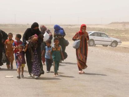 Familias iraquíes despllazadas por el avance del EI llegan a Kirkuk