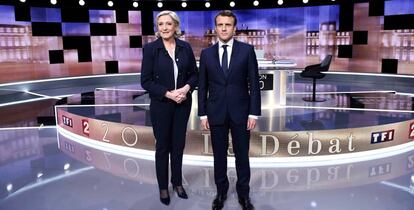 Marine Le Pen y Emmanuel Macron posan instantes antes del &uacute;ltimo debate.
