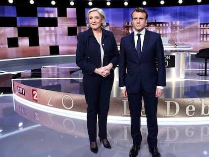 Marine Le Pen y Emmanuel Macron posan instantes antes del &uacute;ltimo debate.