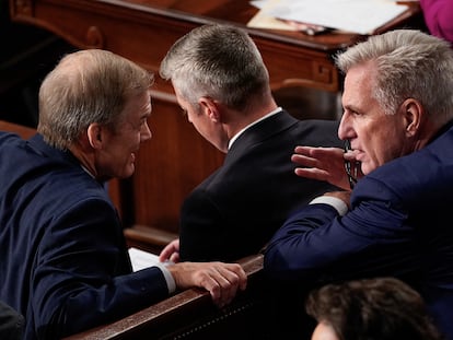 Congressman Jim Jordan (left) talks with former Speaker of the House of Representatives, Kevin McCarthy, on Tuesday in the chamber.