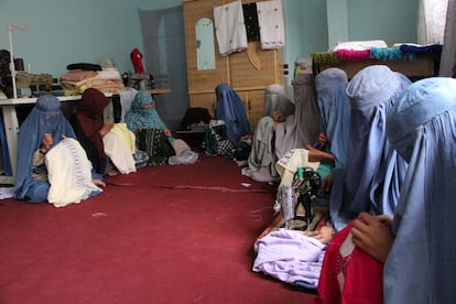 Afghan women sew clothes in a workshop in Kandahar.