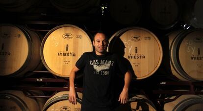 Andr&eacute;s Iniesta in his own wine cellar.