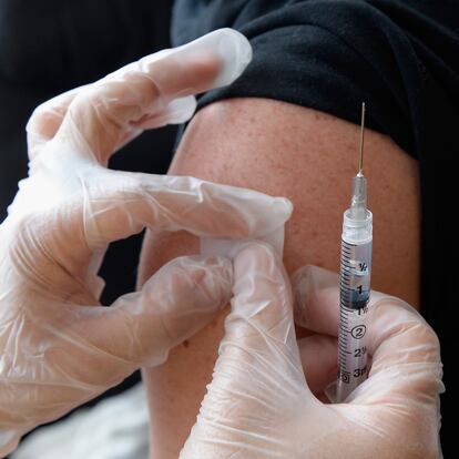 HOLLYWOOD, CA - APRIL 15:  People receive a free meningitis vaccine from  Dr. Wayne Chen at the AIDS Healthcare Foundation pharmacy on April 15, 2013 in Hollywood, California. The AIDS Healthcare Foundation started free meningitis vaccines after a West Hollywood man died from the disease.  (Photo by Kevork Djansezian/Getty Images)