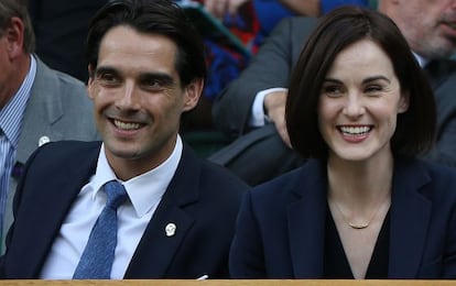 La actriz Michelle Dockery y su novio, John Dineen, en un partido de tenis en 2014.