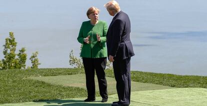 La canciller alemana, Angela Merkel, y el presidente de EE UU, Donald Trump, en la reuni&oacute;n del G7, el pasado d&iacute;a 7 en Charlevoix (Qu&eacute;bec, Canad&aacute;).