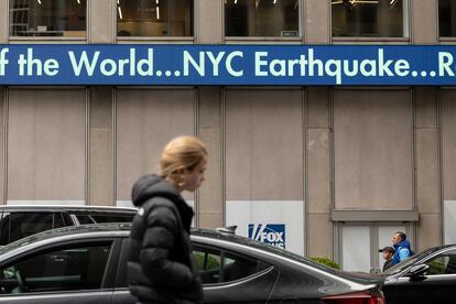 A display shows the news about an earthquake in New York City at News Corp Headquarters, Friday, April 5, 2024, in New York.