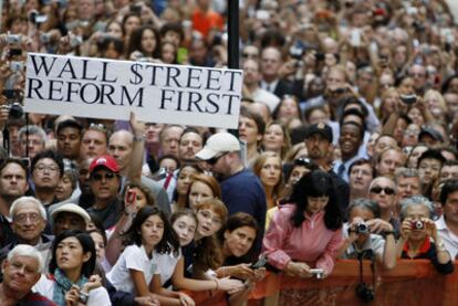 Ciudadanos de Nueva York, durante el discurso pronunciado por Obama en Wall Street el pasado 14 de septiembre.