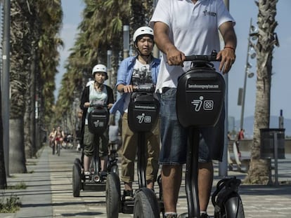 Tourists on a segway tour of Barcelona.