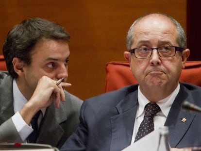 Felip Puig y el director de la Policía, Manel Prat, en una comparecencia