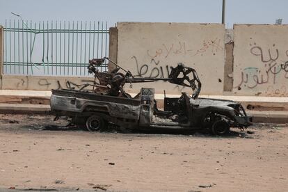 A destroyed military vehicle is seen in southern in Khartoum, Sudan, Thursday, April 20, 2023