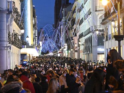 Packed scenes in Preciados street in Madrid.