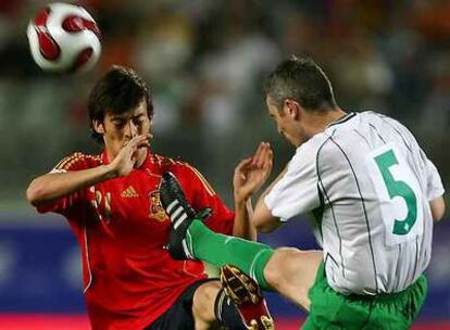 Silva, frente al norirlandés Craigan.