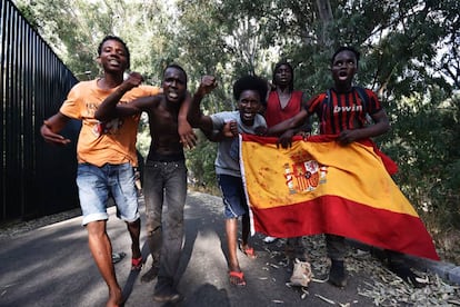 Migrants celebrate their arrival in Ceuta.