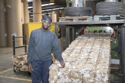 Hagie Waggeh, an employee at the cardboard manufacturing company Cartonajes Izquierdo.