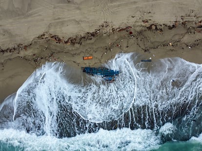 A view of part of the wreckage of a capsized boat that was washed ashore at a beach near Cutro, southern Italy, on Monday, February 27, 2023.