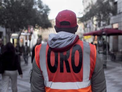 A gold seller on the streets of Madrid.