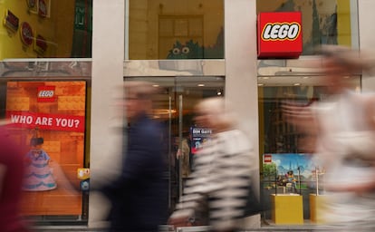 People pass a Lego store in Copenhagen, Denmark August 29, 2023. REUTERS/Tom Little