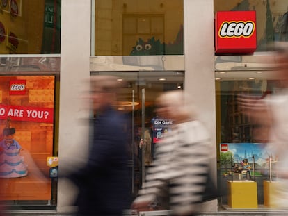 People pass a Lego store in Copenhagen, Denmark August 29, 2023. REUTERS/Tom Little