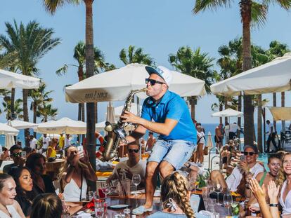 Be careful the saxophonist at Nikki Beach doesn't knock your drink over.