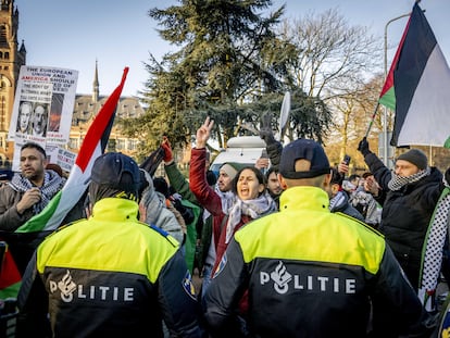 Police control pro-Palestinian protesters outside the UN International Court of Justice in The Hague on January 11.