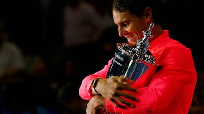 Nadal holds the US Open trophy in New York.