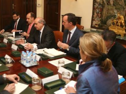 Reunión entre el ministro del Interior, Jorge Fernández (derecha), con su homólogo francés, Claude Guéant.