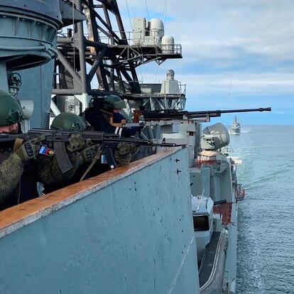 In this photo taken from video released by Russian Defense press service on Thursday, Sept. 12, 2024, Russian servicemen stand on a deck of the Russian destroyer Vice-Admiral Kulakov during the Ocean-2024 strategic command and staff exercises in the Arctic Ocean. (Russian Defense Ministry Press Service via AP)