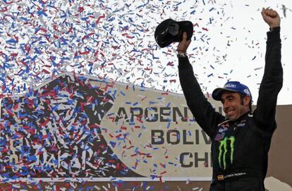Nani Roma celebrates on the podium after winning the sixth South American edition of the Dakar Rally. 